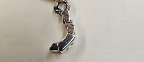 Pendentif-demi-bague-en-acier-bijouterie-a-Toulon
